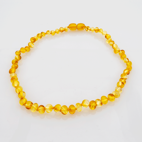 Baby-Bernsteinkette mit Barockperlen - Honig