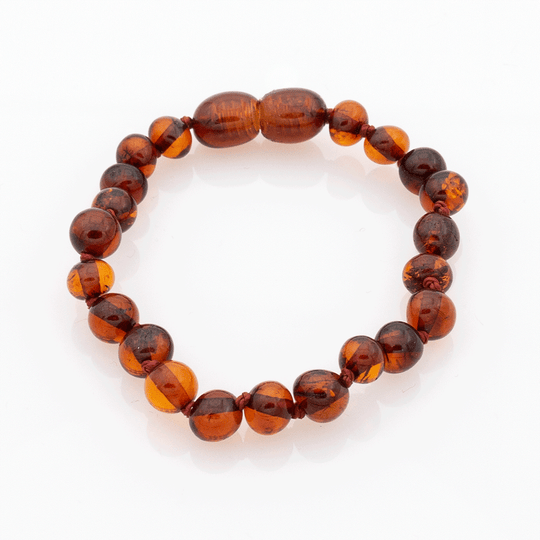Baby Bernsteinarmband Barockperlen - Cognac