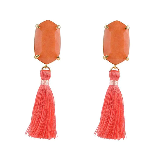 Boucle d'oreille à pompon doux melon