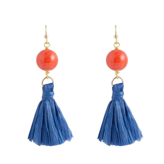 Boucle d'oreille à pompon