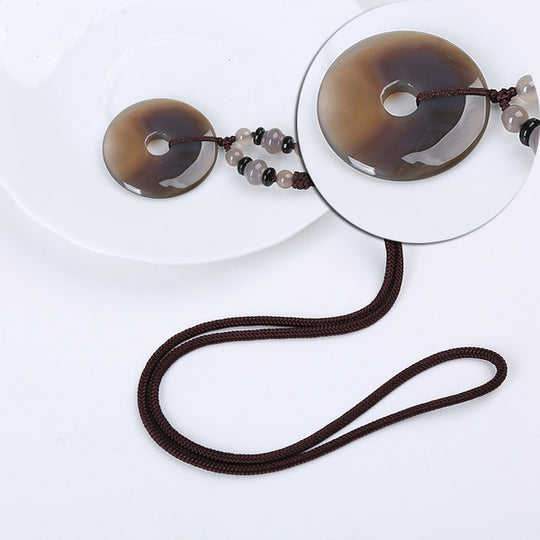 Yumten-Anhänger mit rundem braunem Achatstein