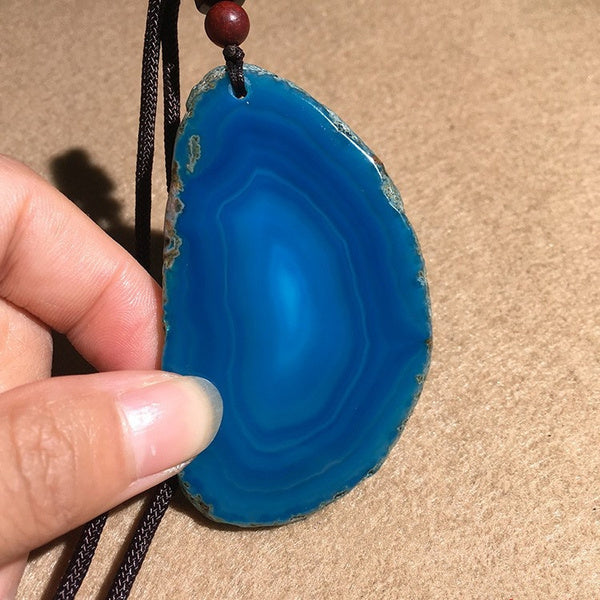 Pendentif en agate naturelle polie - couleur bleu - Gemio.ch